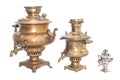 Three vintage ethnic russian tea urns - samovar on white background