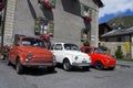 Three vintage Fiat 500 cars stand on street on 1 August 2016 in Livigno, Italy.