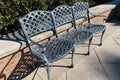 Three vintage green metal garden chairs bench Royalty Free Stock Photo