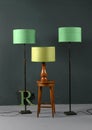 Three vintage lamps with green shades