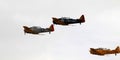 Three vintage military planes flying in formation Royalty Free Stock Photo