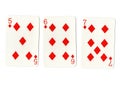 Three vintage playing cards showing a run of diamonds.