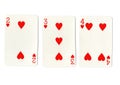 Three vintage playing cards showing a run of hearts.