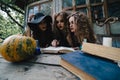 Three vintage witches perform magic ritual Royalty Free Stock Photo