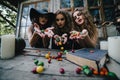 Three vintage witches perform magic ritual Royalty Free Stock Photo