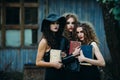 Three vintage women as witches