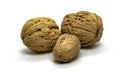 Three walnuts on a white