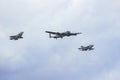 Three warbird in flight during an airshow