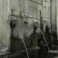 Three waterspouts in a stone memorial in the town of Ston, Dubrovnik - Neretva, Croatia Royalty Free Stock Photo