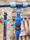 Three way joint of the PVC pipe. Potable water delivery system Royalty Free Stock Photo