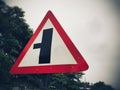 Three way junction warning sign board, intersection traffic sign on the roadside Royalty Free Stock Photo