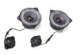 Three-way speaker system, coaxial speaker, car audio music, subwoofer and tweeter on white isolated background. Top view Royalty Free Stock Photo