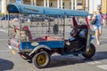 Three wheel bikes stop on road