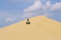 A three wheeler dune buggy rides in Little Sahara State Park in Oklahoma