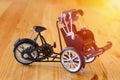 three - wheeler tricycle taxi model on wooden Royalty Free Stock Photo