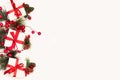 Three white boxes with red bows and christmas ornaments on a white background Royalty Free Stock Photo