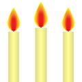 Three real white burning candles