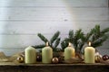 Three white burning candles on the third advent, christmas decor Royalty Free Stock Photo