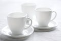Three white cups.