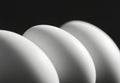 Three White Eggs in Monochromatic Close up Royalty Free Stock Photo