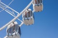 Three white gondolas on SkyStar Observation Wheel at Pier 39 Royalty Free Stock Photo
