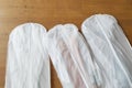 Three white Hanging Garment Bag on the floor. The morning before the wedding. Pack your things on a trip or sort and hang up your Royalty Free Stock Photo