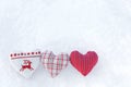 3 Three white hearts with winter cross stitch deer in red on snow. Scandinavian Norwegian styled Royalty Free Stock Photo