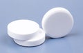 Three white medical pills Royalty Free Stock Photo