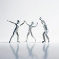 Three White miniature people dancing on white background