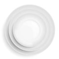 Three white plates stacked on top of each other Royalty Free Stock Photo