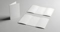 Three white rectangular objects on a gray background possibly booklets or papers Royalty Free Stock Photo