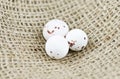 Three white speckled eggs