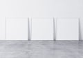 Three white square frames Standing on concrete gray floor with white background