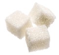 Three white sugar cubes on white background. Macro picture Royalty Free Stock Photo