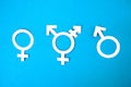 Three white symbols for gender on blue background. concept transgender