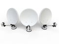 Three white TV satellite dishes - top view Royalty Free Stock Photo