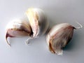Three Whole Garlic Cloves with Skin On