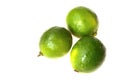 Three whole limes isolated on white background Royalty Free Stock Photo