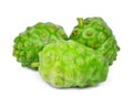 Three whole of noni fruit isolated on white