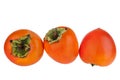 Three whole persimmon orange fruit with green leaves on white background isolated close up, top view, side view, rear view