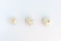 three whole raw garlic. Minimalist photo of raw garlic. Ingredients photo concept