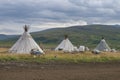 Three wigwams of modern reindeer herders. Yamalo-Nenets Autonomous Okrug Royalty Free Stock Photo