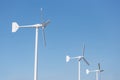 Three wind turbine on blue sky Royalty Free Stock Photo