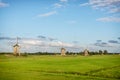 Three windmills in the countryside in the Netherlands Royalty Free Stock Photo