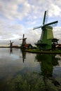 Three windmills at dawn in the Netherlands. Royalty Free Stock Photo