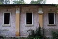 Three windows in an abandoned building Royalty Free Stock Photo