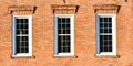 Three Windows on Brick Building  Architecture Royalty Free Stock Photo