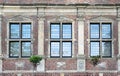 Three windows of old Raesfeld water castle in Germany Royalty Free Stock Photo