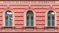Three windows on a pink wall Royalty Free Stock Photo