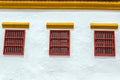 Three Windows and a White Wall Royalty Free Stock Photo